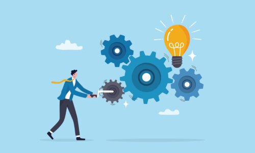 System development, innovation to get idea, solution or improvement, efficiency, effort or working progress, automation concept, businessman turning cogwheel to help system get new lightbulb idea.